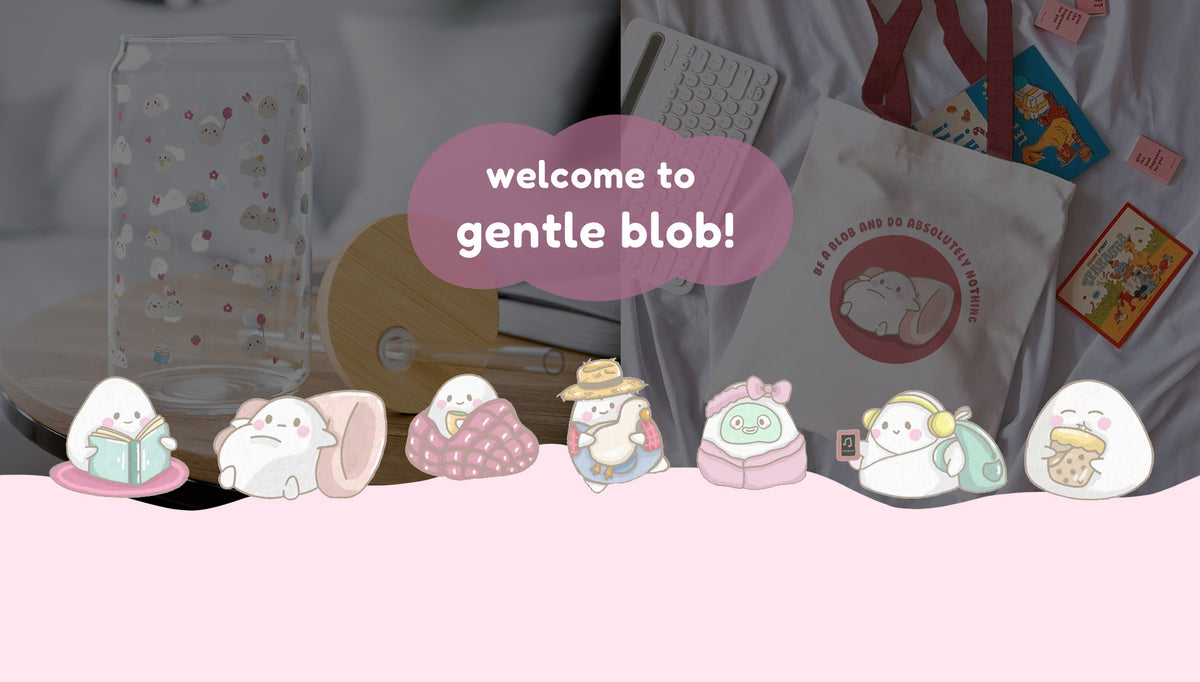 Gentle blob products styled on a desk: a printed glass cup, a canvas tote bag and art prints, with a row of blob characters along the bottom